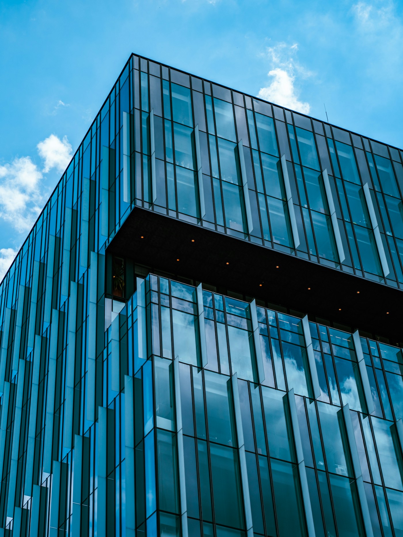 Glass architecture reflecting the sky